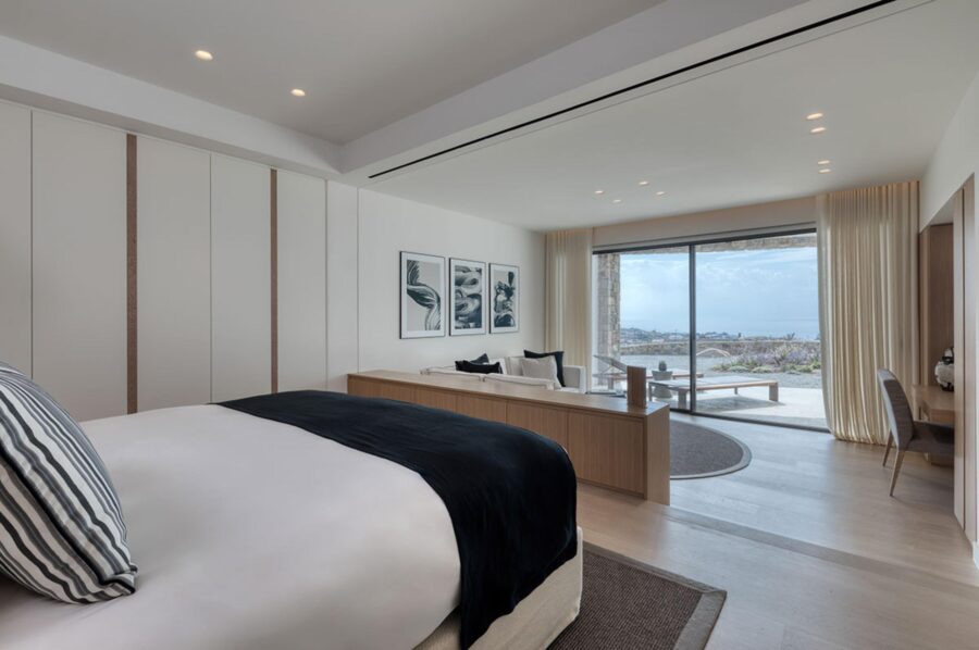 villa-petra-bedroom-scenic-sea-views-desk-lounge-area-serene-modern-interior-luxury-mykonos