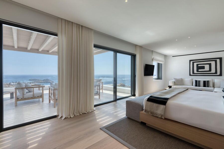 villa-petra-bedroom-scenic-sea-views-private-balcony-serene-design-luxury-mykonos