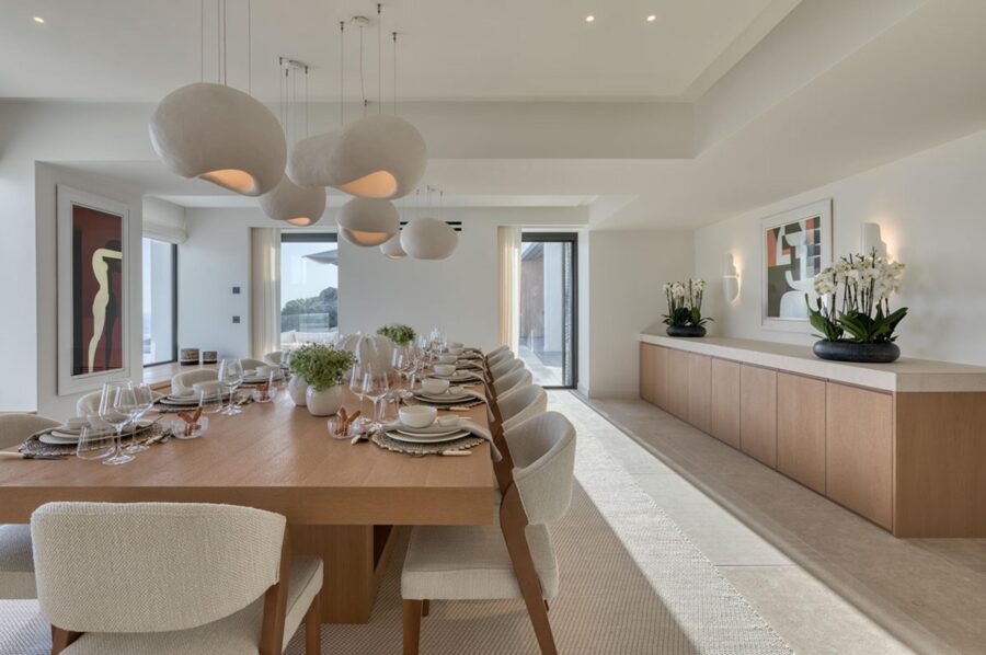 villa-petra-dining-room-elegant-lighting-artwork-serene-design-luxury-interiors-mykonos