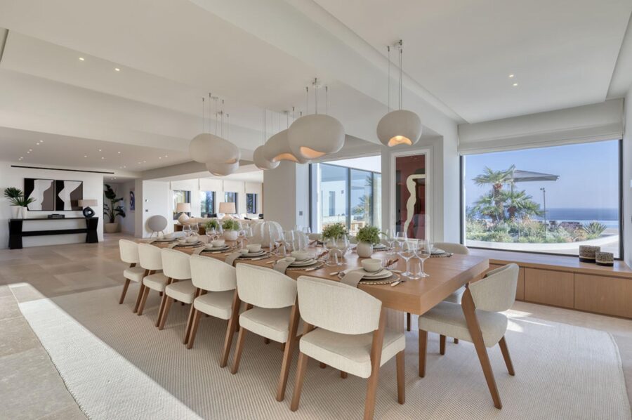 villa-petra-dining-room-grand-spacious-bright-design-elegant-lighting-artwork-luxury-interiors-mykonos
