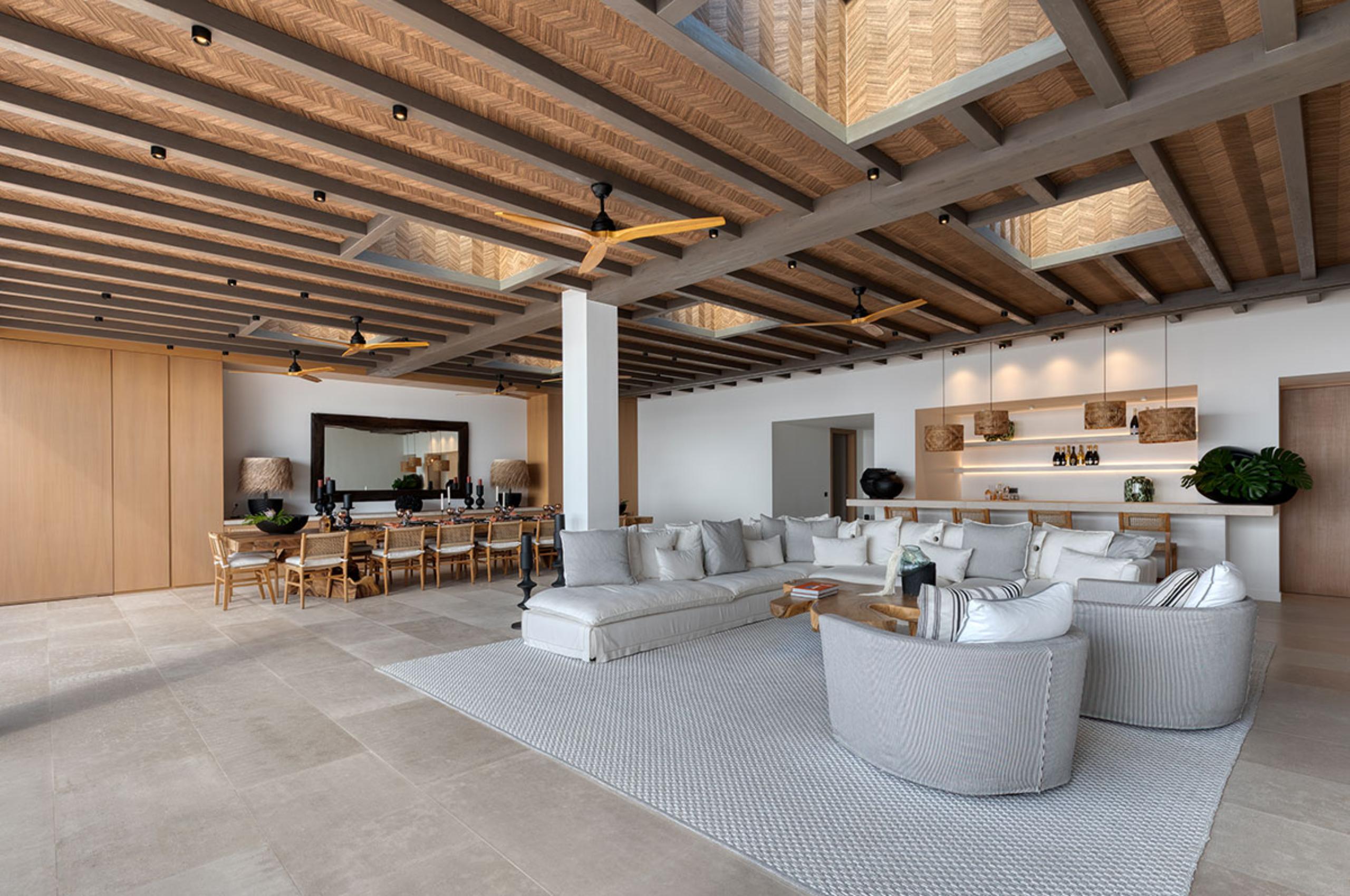 villa-petra-living-room-dining-area-bar-openplan-hosting-entertaining-luxury-interior-mykonos