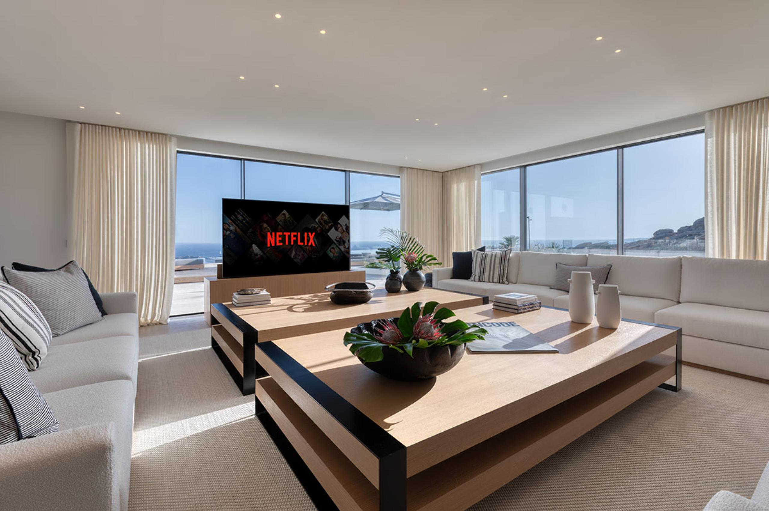 villa-petra-living-room-lounge-tv-room-scenic-sea-views-bright-serene-interiors-luxury-mykonos