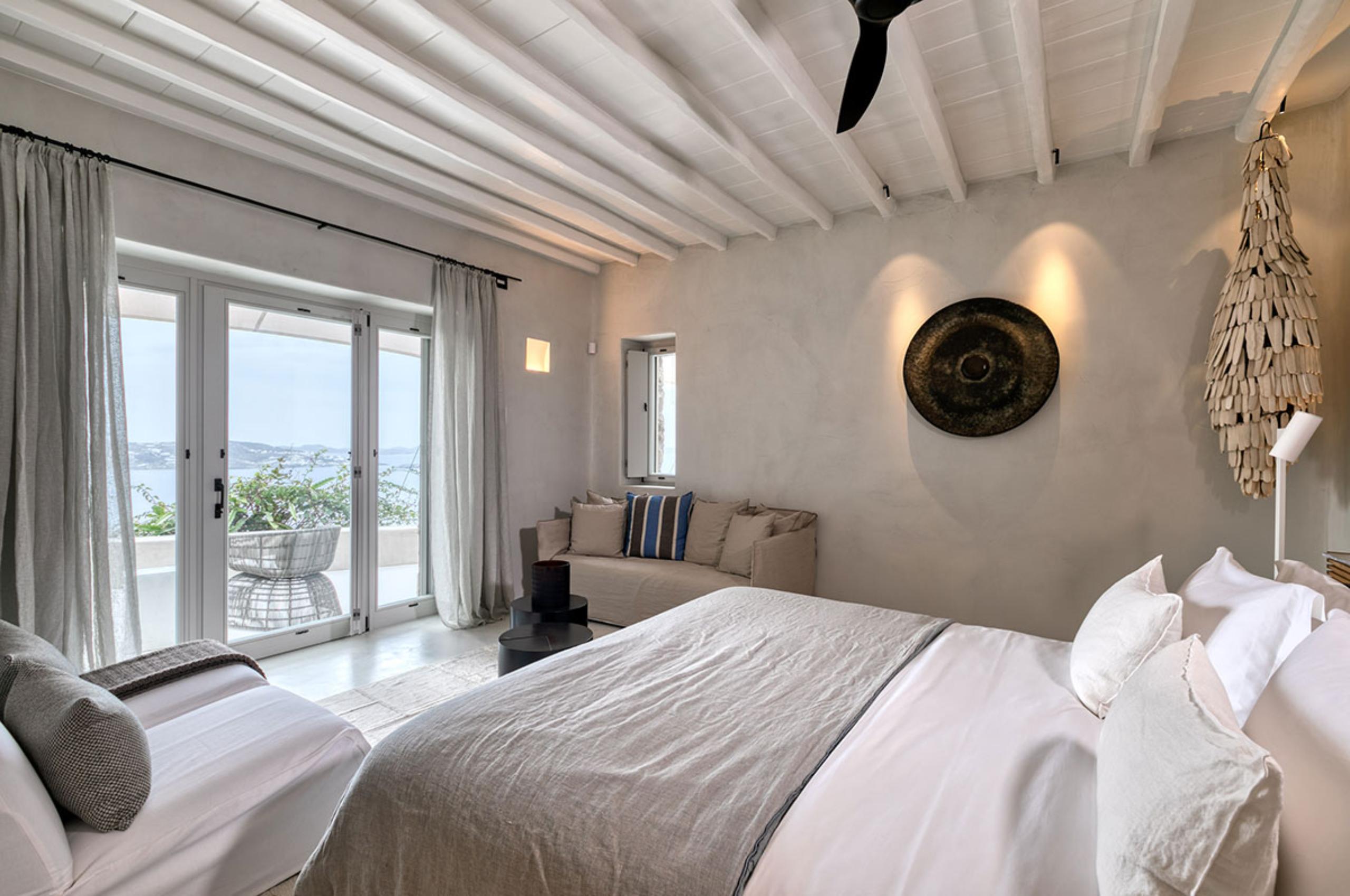 villa-selina-bedroom-sea-view-balcony-serene-tranquil-mediterranean-design-luxury-mykonos
