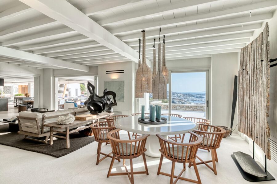 villa-selina-dining-area-living-room-openplan-sea-view-terrace-access-modern-bright-interior-luxury-mykonos