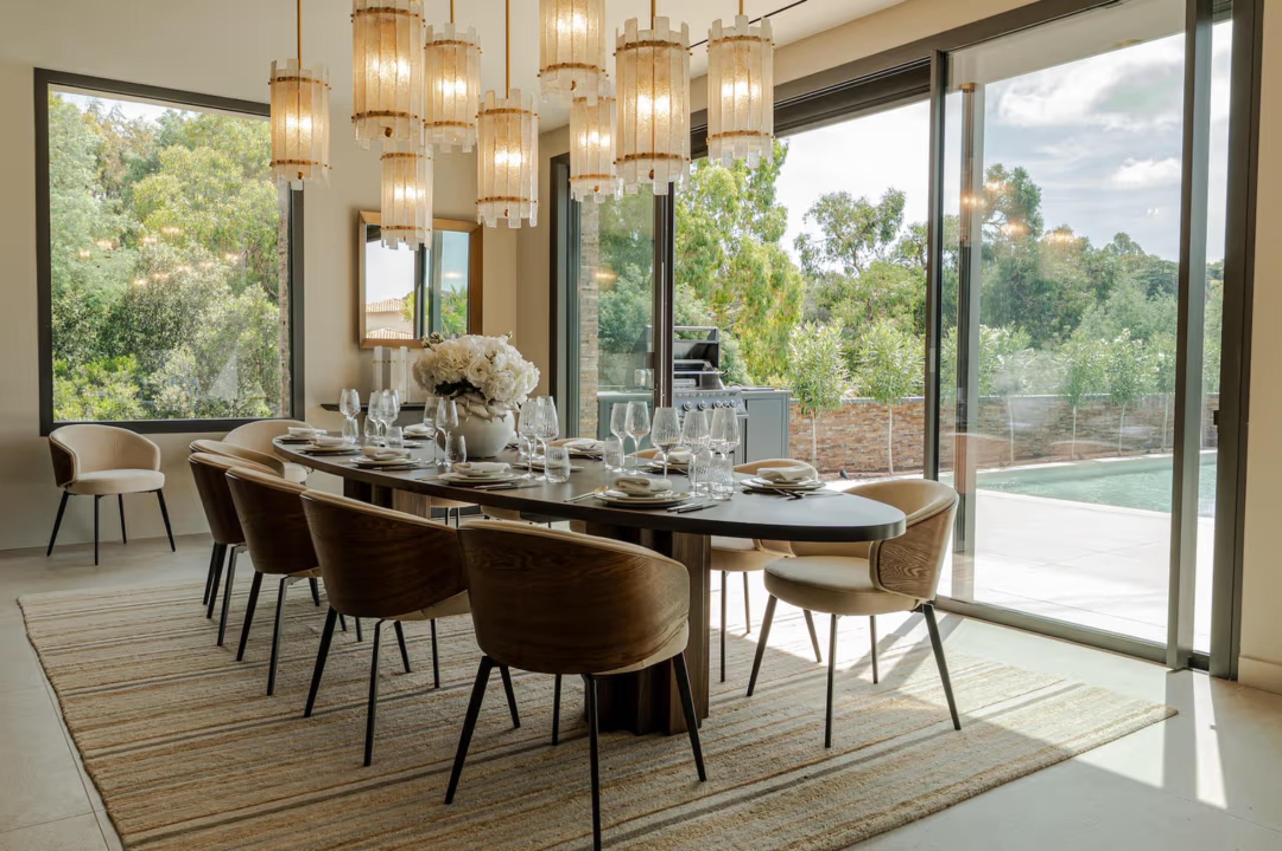 villa-soline-dining-room-elegant-grand-interior-design-pool-views-luxury-lacroixvalmer