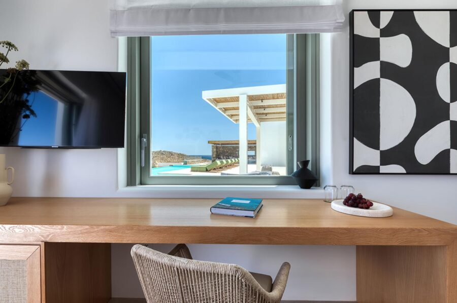 villa-theodora-bedroom-desk-pool-view-tv-artwork-luxury-mykonos