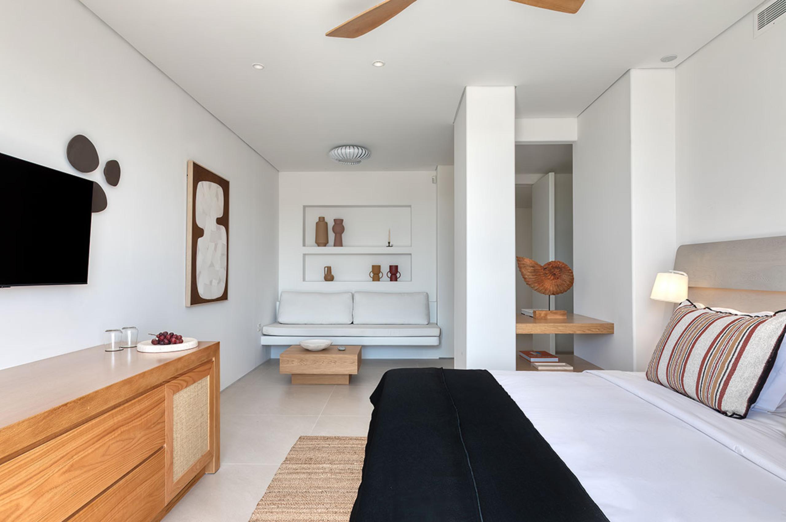 villa-theodora-bedroom-lounge-area-elegant-serene-mediterranean-design-luxury-mykonos