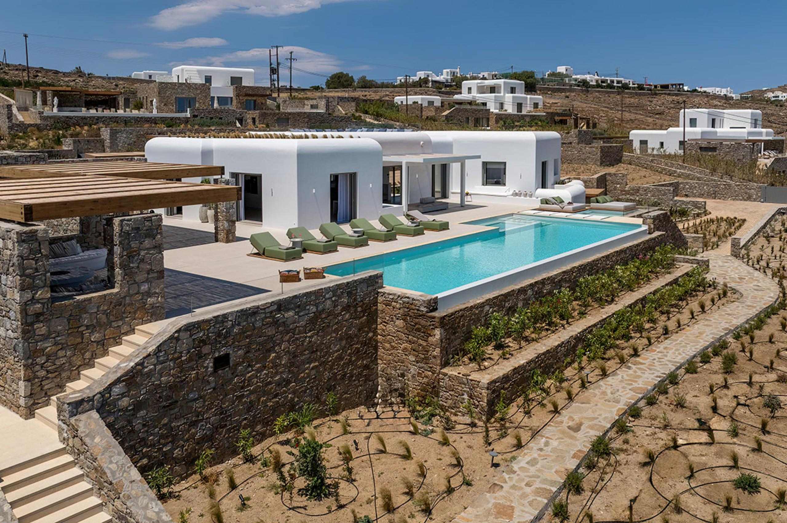 villa-theodora-exterior-swimming-pool-gardens-terrace-luxury-rental-retreat-mykonos