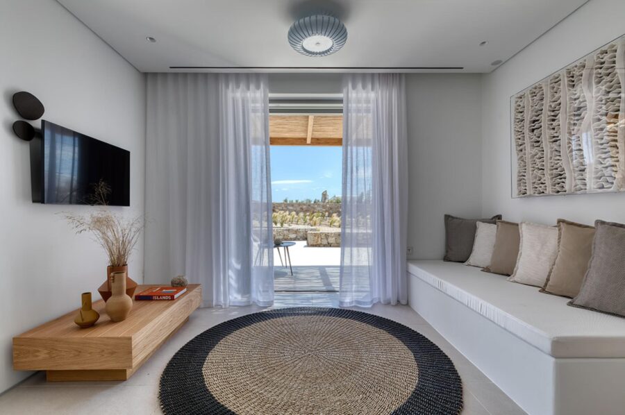 villa-theodora-living-area-terrace-access-tv-room-serene-design-relaxing-luxury-mykonos