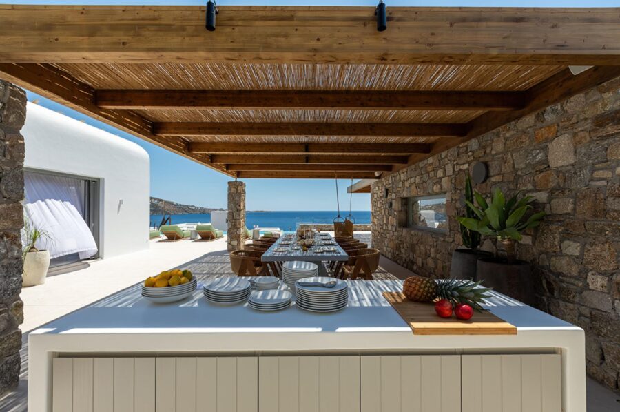 villa-theodora-summer-kitchen-dining-area-sea-view-luxury-mykonos