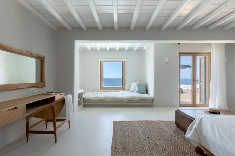 villa-zeta-bedroom-window-seat-scenic-sea-views-desk-tranquil-serene-interior-design-luxury-mykonos
