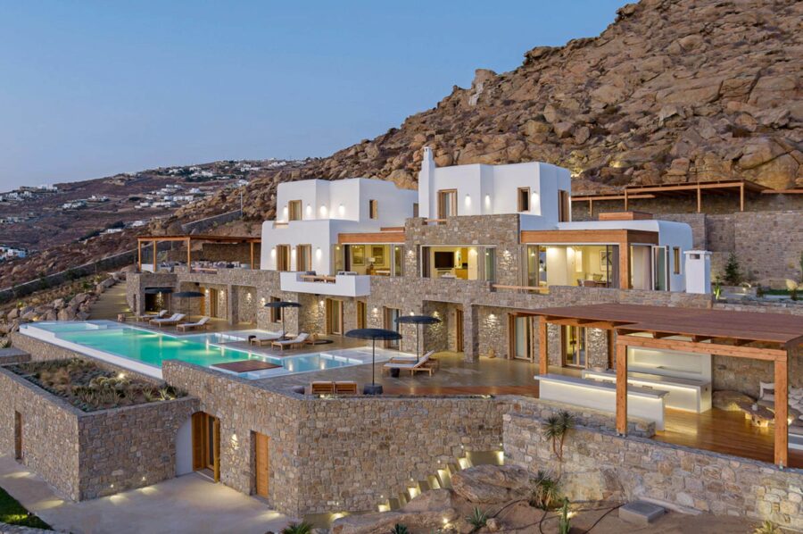villa-zeta-exterior-hillside-rental-retreat-grand-mediterranean-architecture-luxury-mykonos