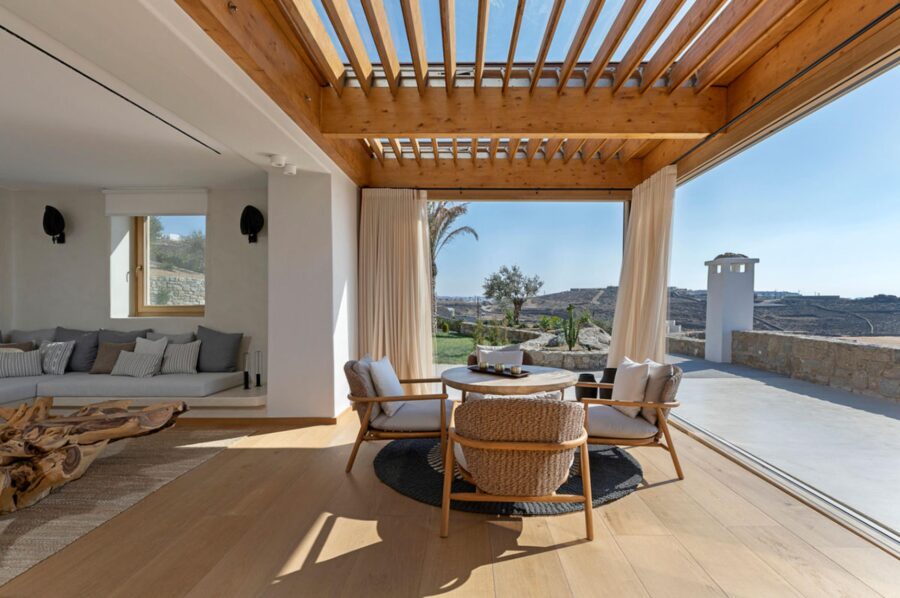 villa-zeta-living-room-dining-openplan-bright-modern-interiors-scenic-views-luxury-mykonos