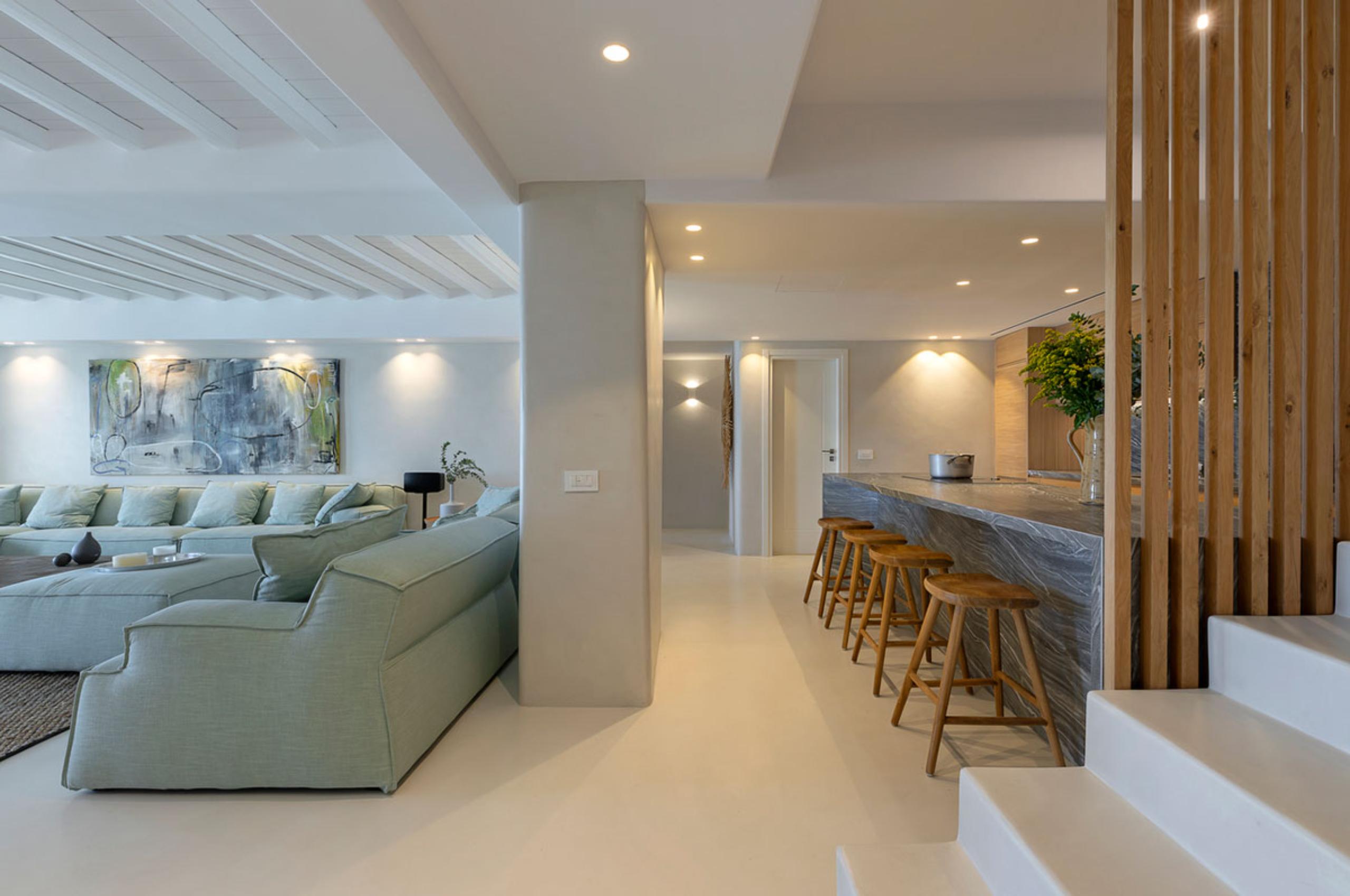 villa-zeta-living-room-lounge-kitchen-openplan-tranquil-modern-design-artwork-luxury-mykonos