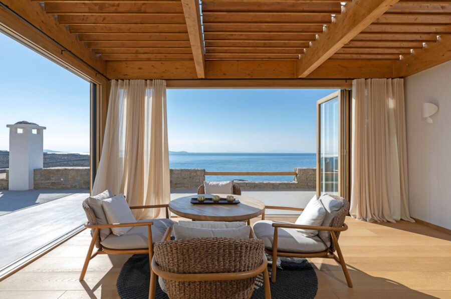 villa-zeta-seating-elegant-interiors-indoor-outdoor-living-sea-views-luxury-mykonos