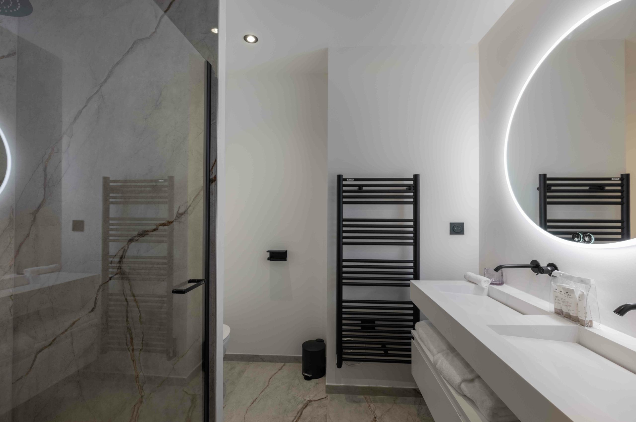 chalet-eira-bathroom-shower-double-sink-sleek-modern-design-luxury-megeve