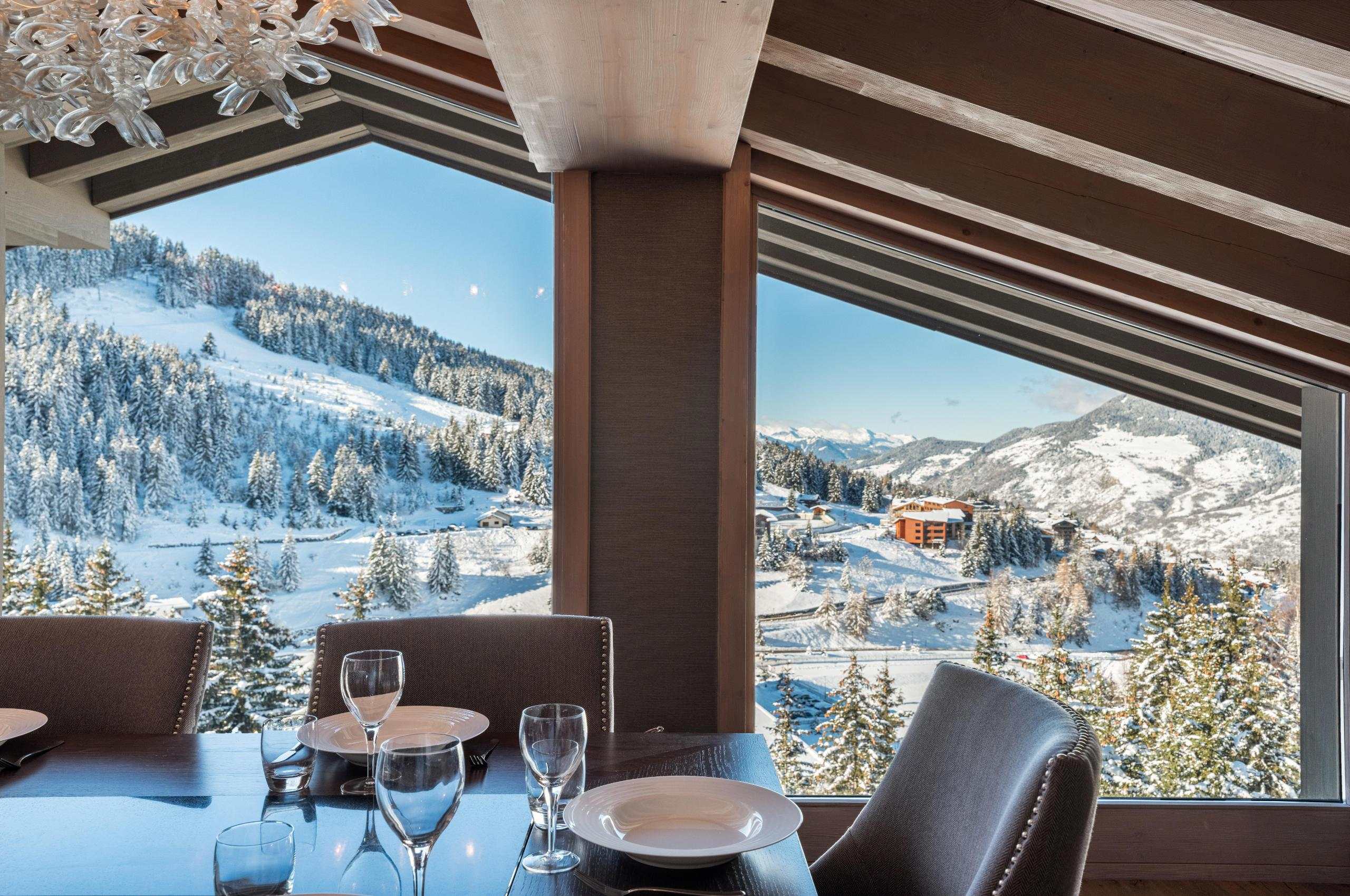 chalet-eve-dining-area-mountain-slopeside-views-luxury-rental-retreat-courchevel1650