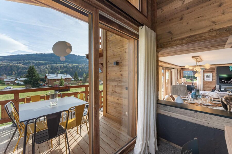 chalet-marnie-balcony-alfresco-dining-scenic-alpine-views-luxury-megeve