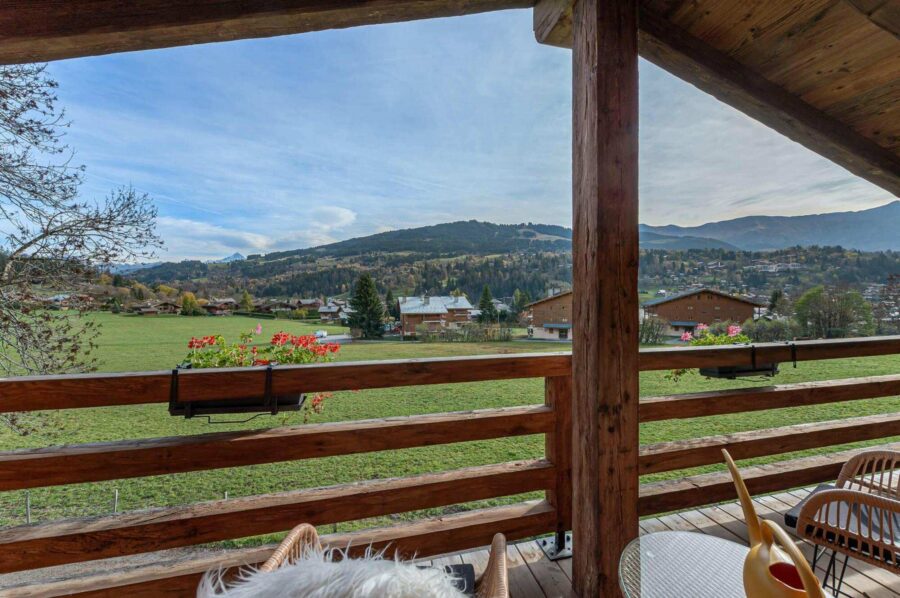 chalet-marnie-balcony-outdoor-seating-scenic-countryside-views-luxury-megeve