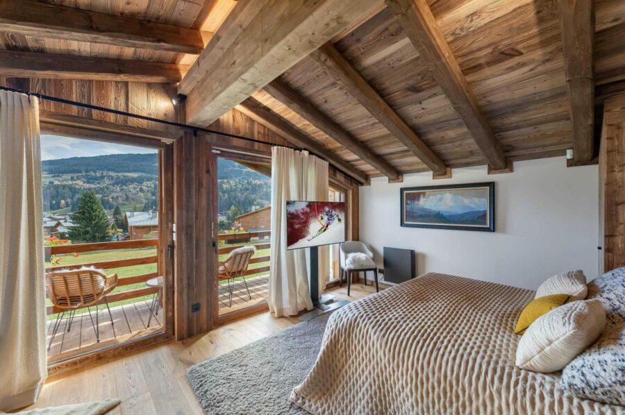 chalet-marnie-bedroom-balcony-scenic-alpine-views-luxury-interiors-megeve
