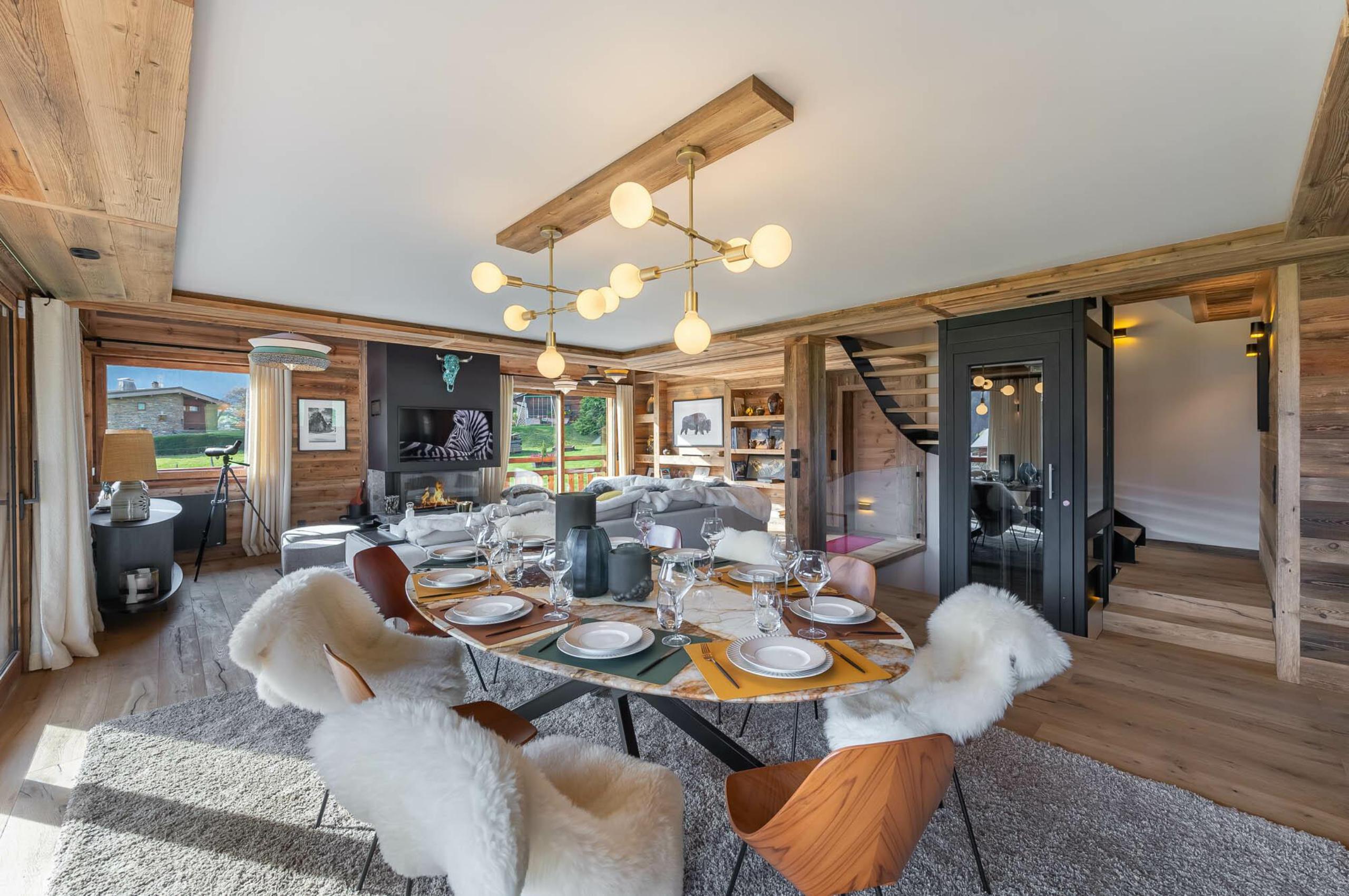 chalet-marnie-dining-area-scenic-views-elegant-alpine-design-luxury-megeve