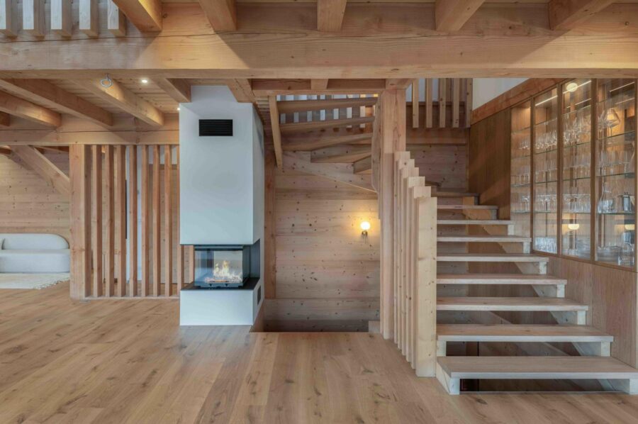 chalet-sadie-fireplace-staircase-elegant-alpine-design-luxury-megeve