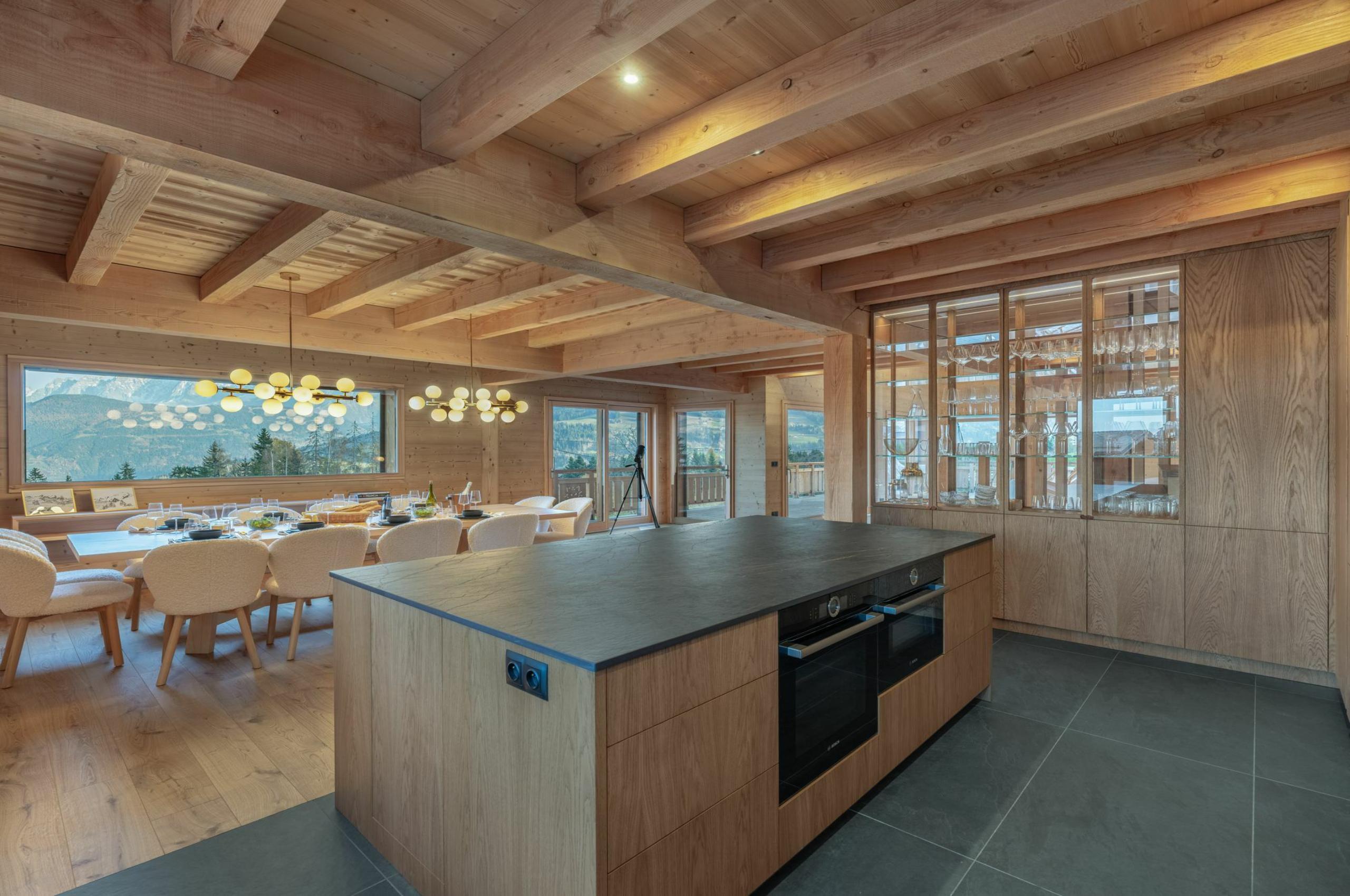 chalet-sadie-kitchen-breakfast-bar-dining-area-mountain-views-luxury-megeve