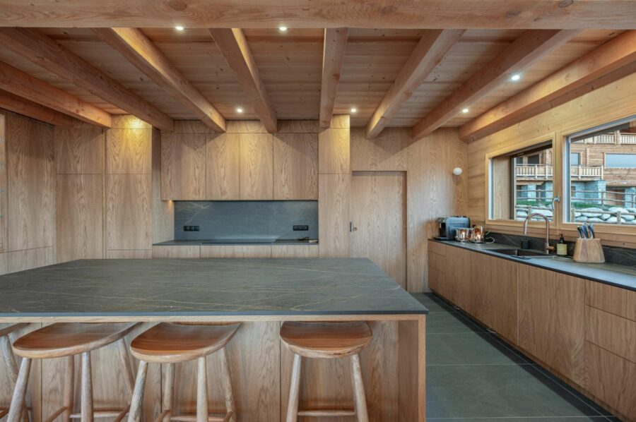 chalet-sadie-kitchen-sleek-modern-design-breakfast-bar-scenic-views-luxury-megeve