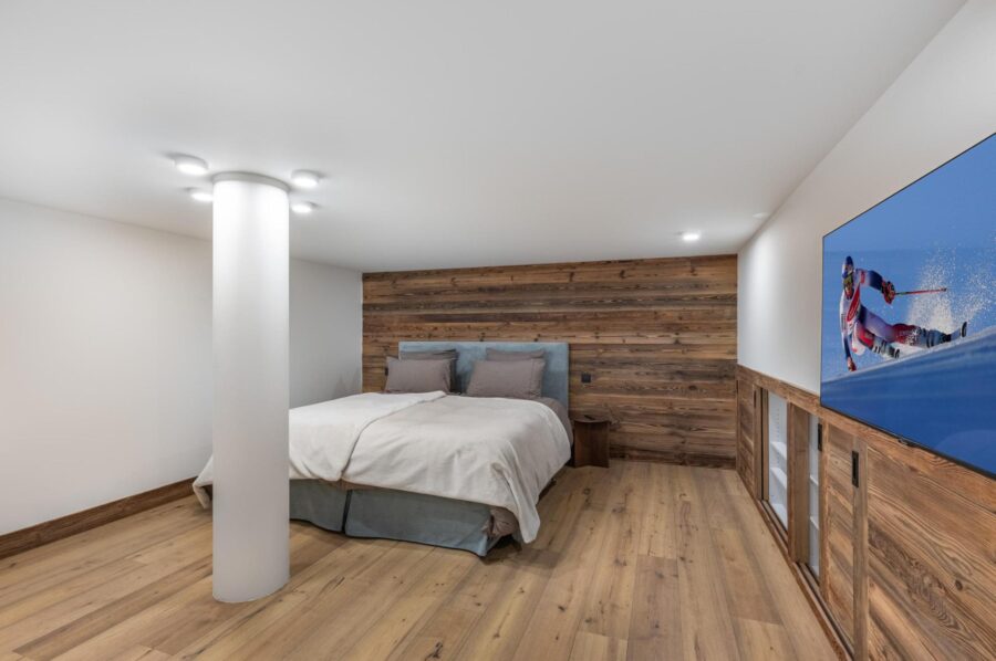 chalet-sage-bedroom-tv-modern-alpine-interior-luxury-megeve