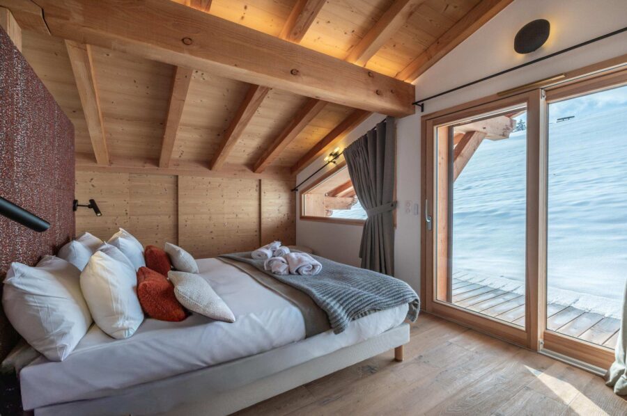 chalet-thalia-bedroom-scenic-snowy-landscape-luxury-megeve