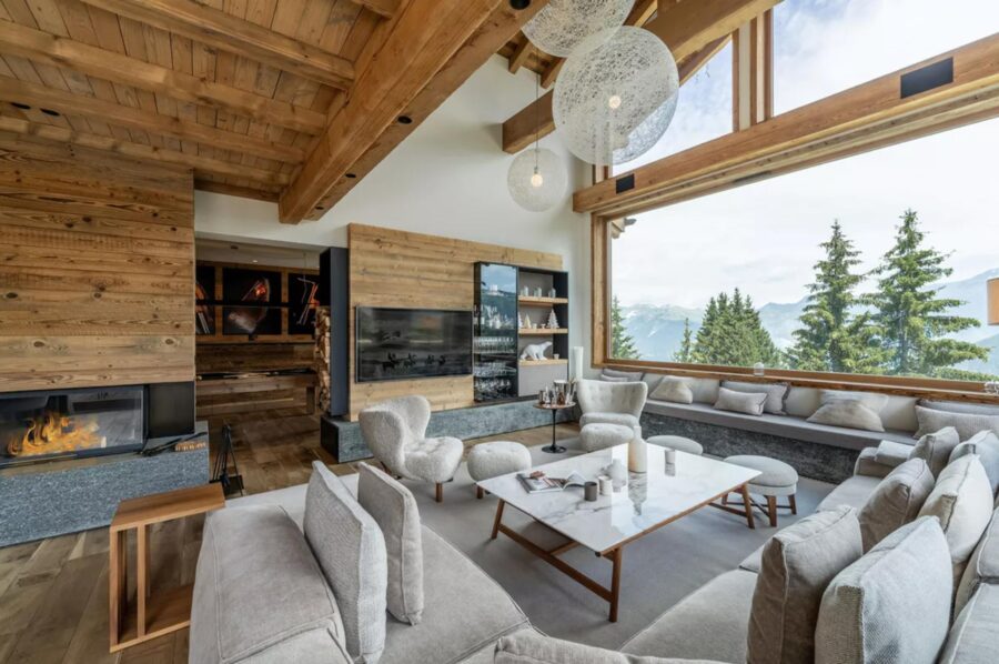 chalet-nina-living-room-fireplace-mountain-views-openplan-luxury-interior-courchevel1850