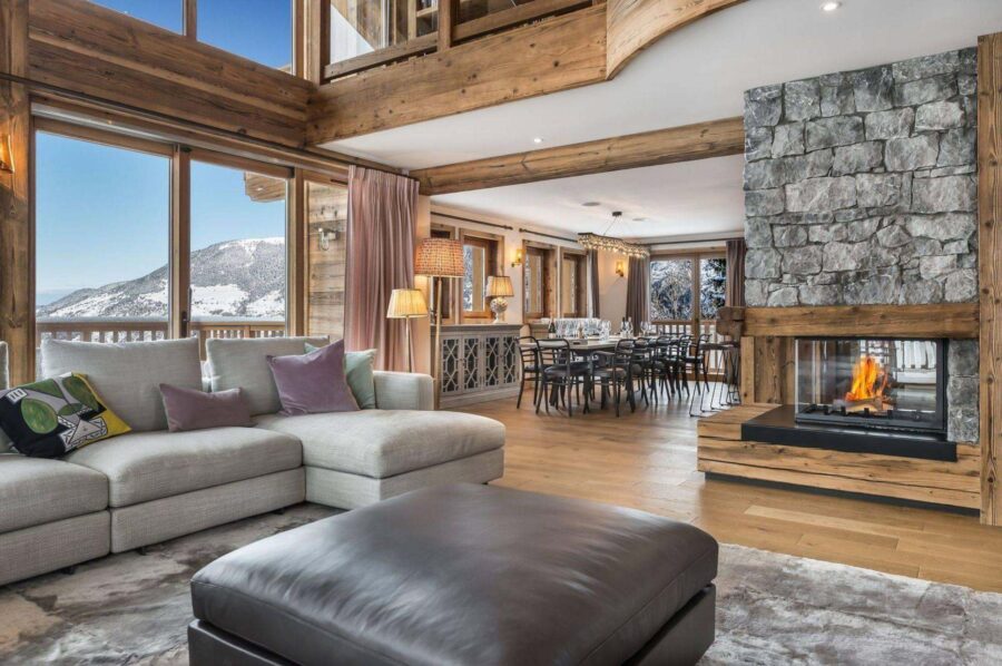 chalet-rae-living-room-fireplace-openplan-dining-area-bright-alpine-interiors-luxury-courchevel1650